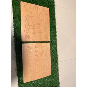 wooden Montessori-style letter and number tracing board set